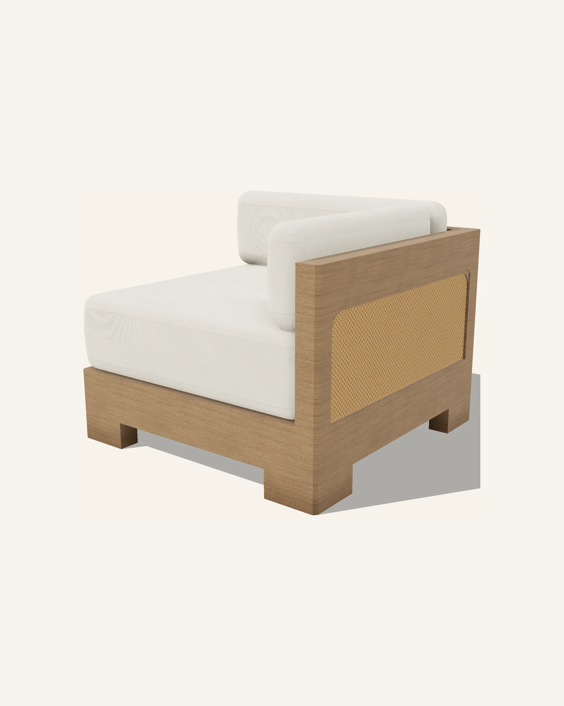The Nasim corner module alone on a plain warm ground: two panelled faces meeting at the corner with the rattan running round both, a loose seat cushion inside the frame and back cushions standing proud of the timber, the base cut away between two feet.