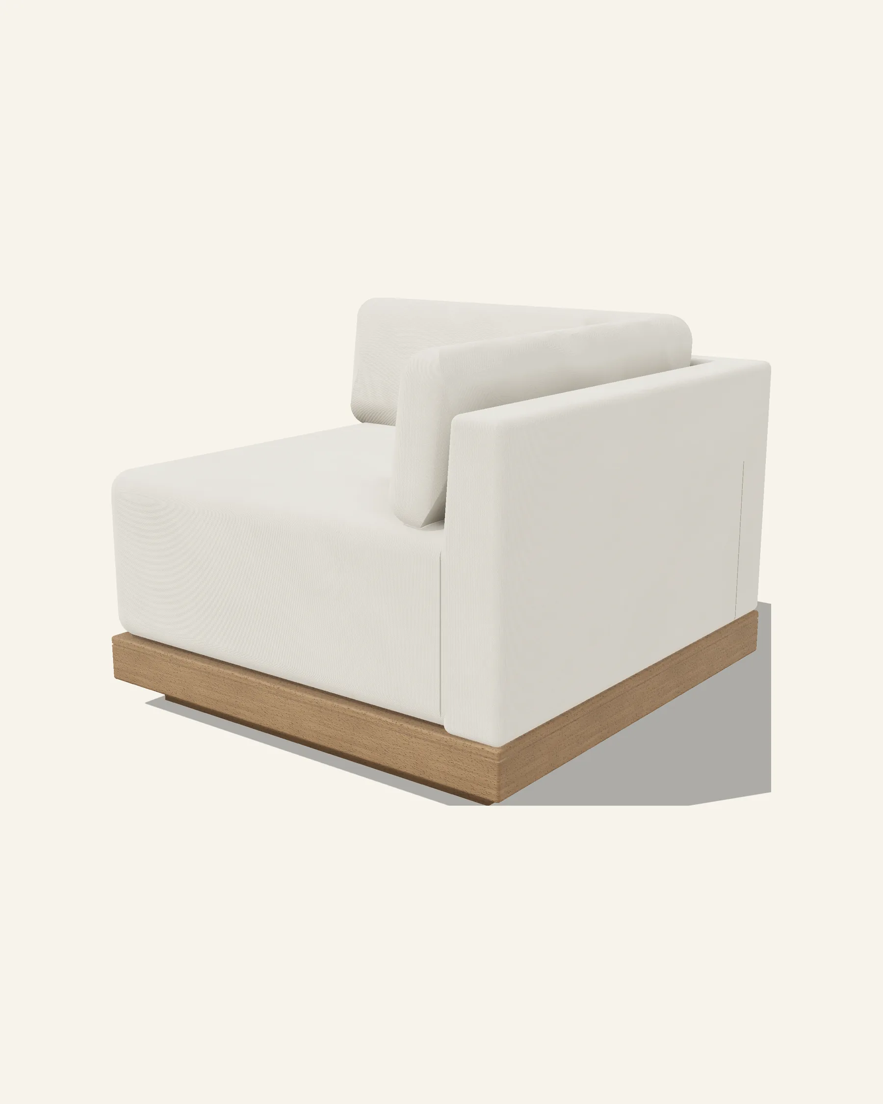 The Rima corner module alone on a plain warm ground: two upholstered panels meeting at the corner, each with its own loose cushion, on the same slim timber band over a recessed plinth.