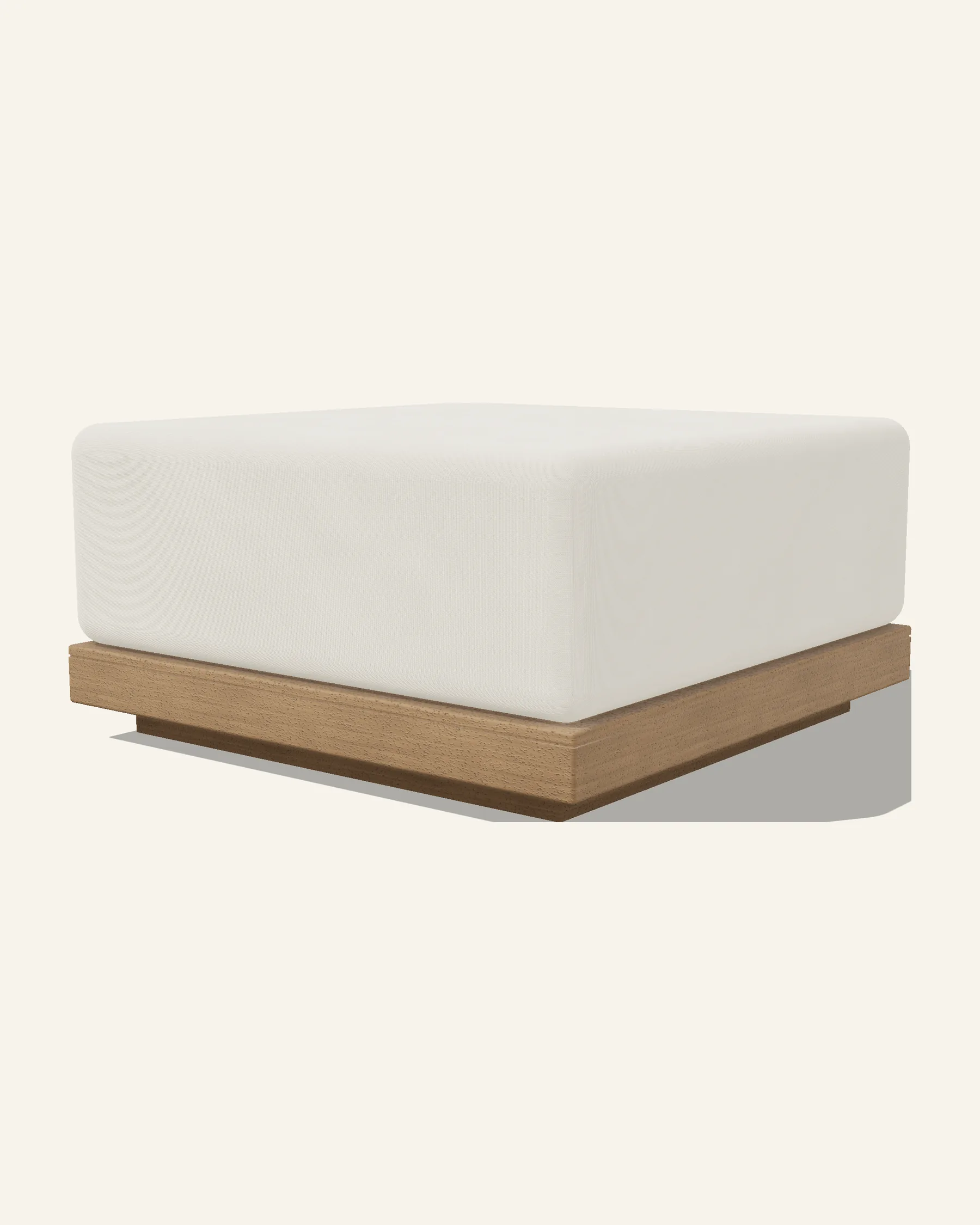 The Rima pouf alone on a plain warm ground: the same upholstered block at seat height with nothing above the cushion, on a slim timber band over a recessed plinth.